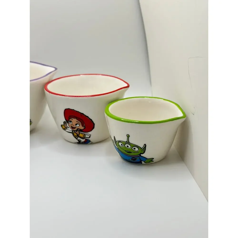 TOY STORY RAE DUNN DISNEYS TOY STORY MEASURING CUPS